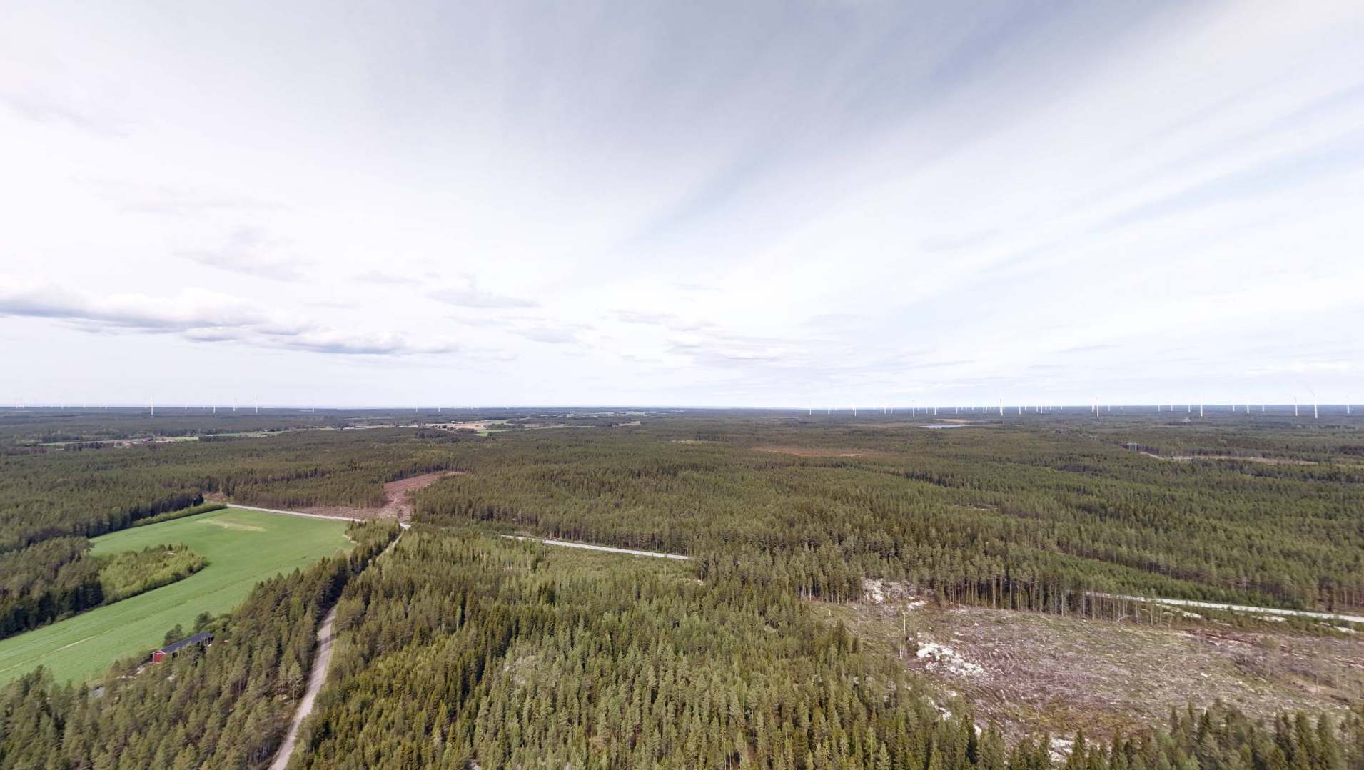 Ilmakuva Jylkän alueesta, jossa on metsää ja peltoja.