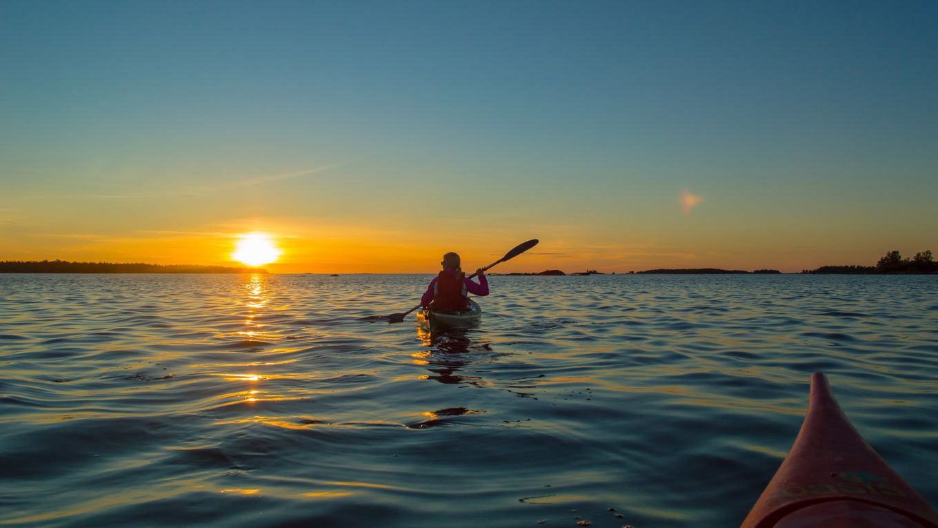 Canoeist at sunset by Kalajoki seaside