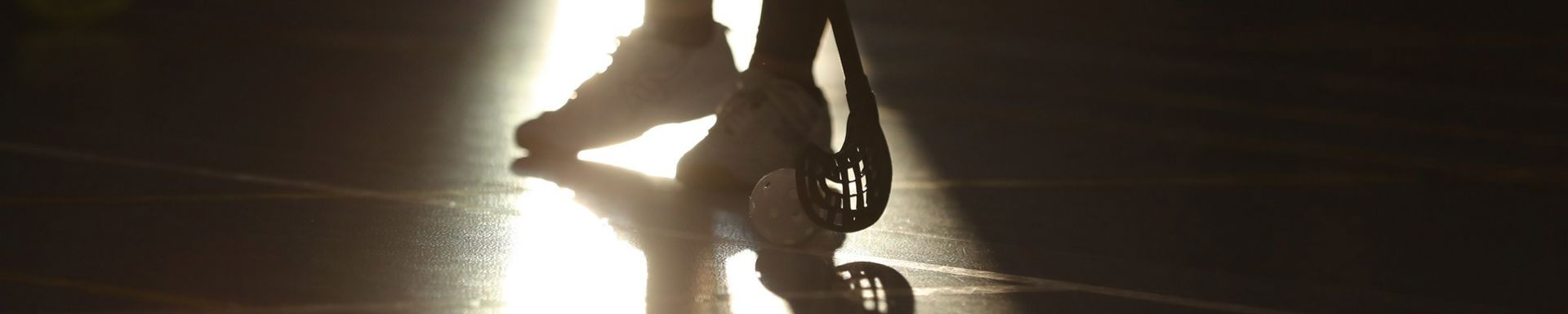 Sählynpelaajan varjo.