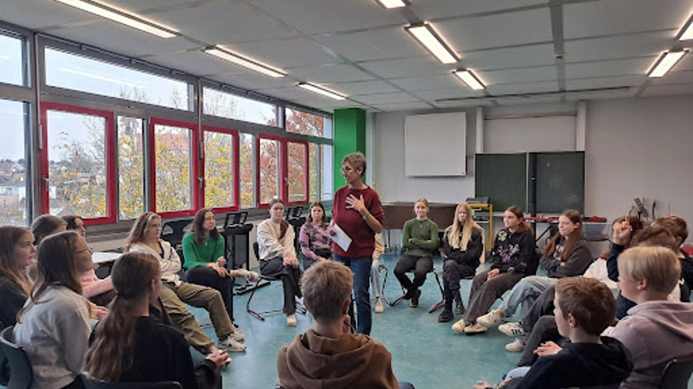 Students talking in a circle