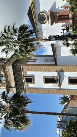 Spanish style house with a tower