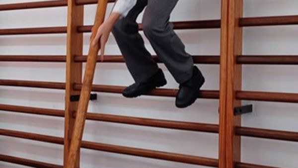 A boy jumping in a gym