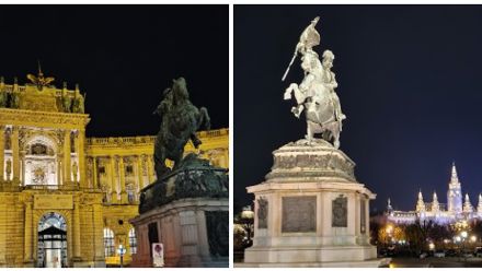 old style buildings and statues at night